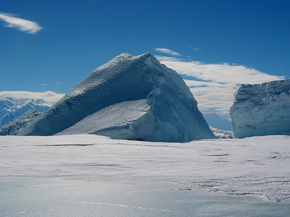 Iceberg trapped in sea ice at Cape Hallett