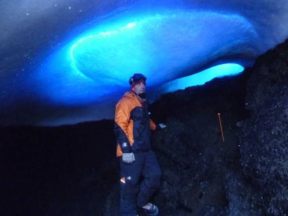 Professor Craig Cary in the 'Blue Dome' ice cave near the Lower Erebus Hut, formed by warm thermal soils