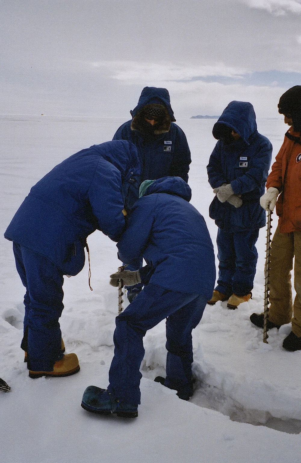 Drilling Sea Ice to check Safety