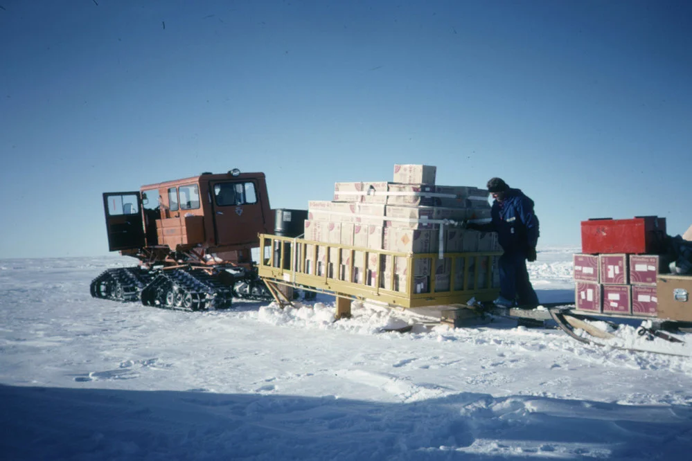 A weighty load! Tucker SnoCat vehicle pulling cargo