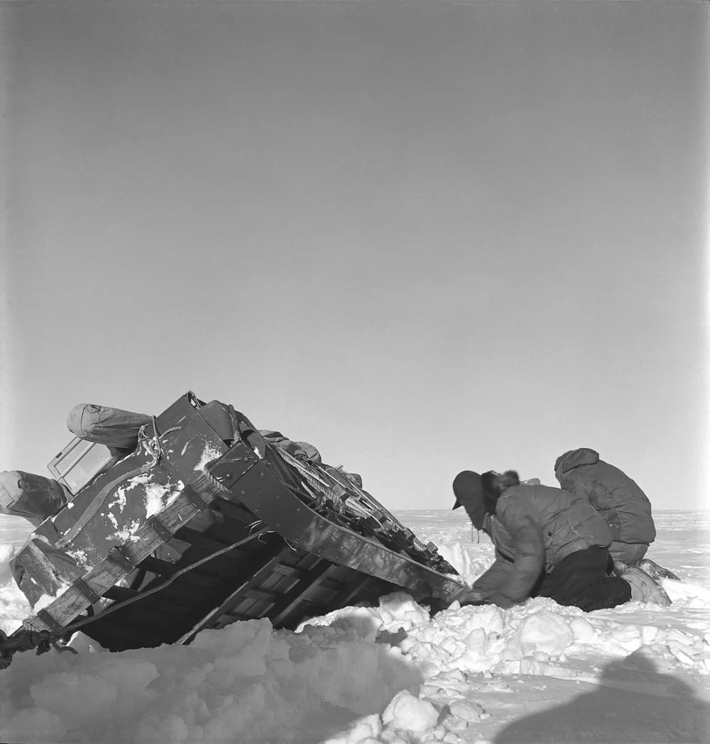 Retrieving supply sledge from a crevasse