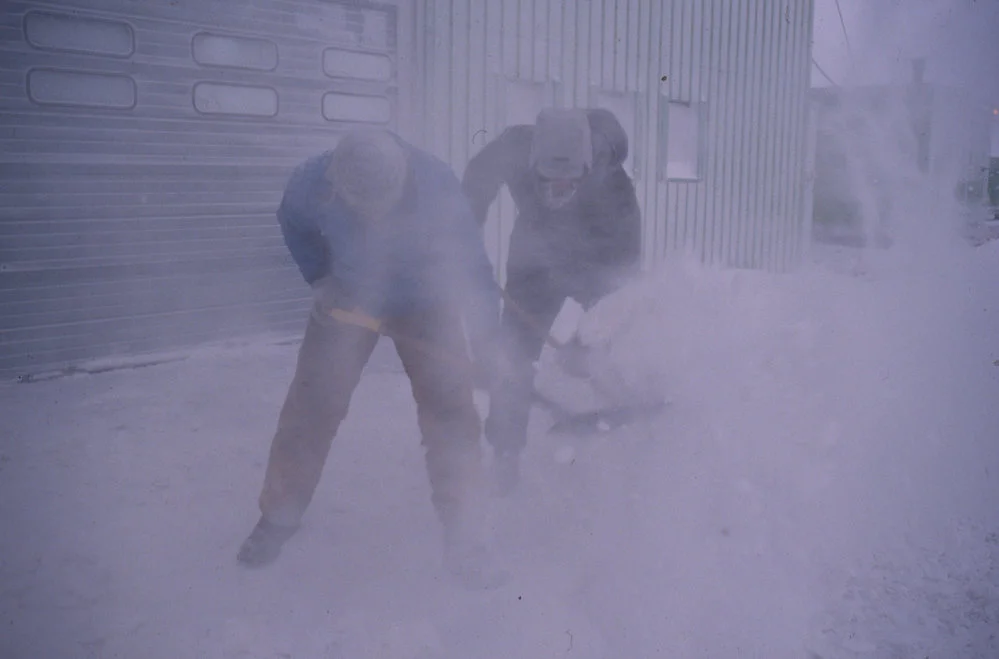 Shovelling Snow in front of The Hangar