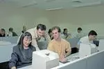 People using computers in computer lab
