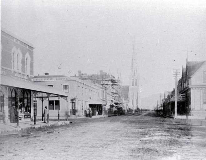 Colombo Street north : on left is Mrs Sharland's corset shop, on corner of Armagh Street is Golden Fleece Hotel.