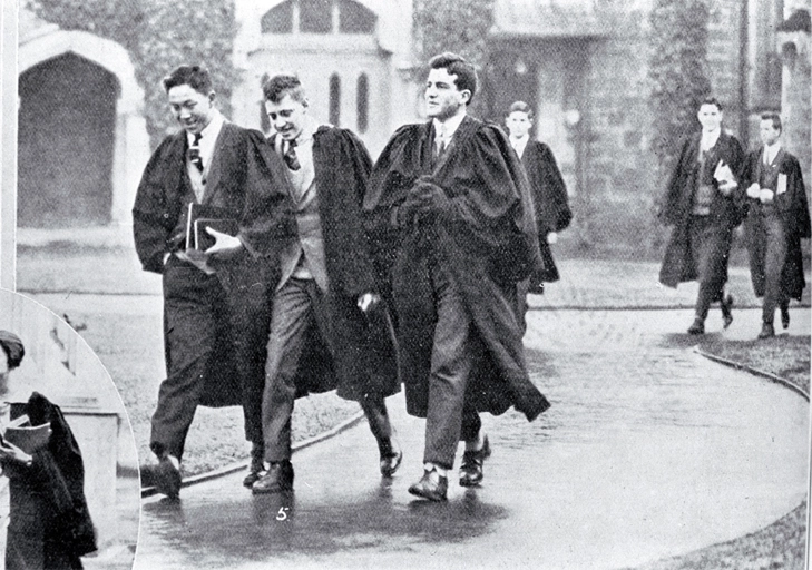 Undergraduate students in gowns in the quadrangle on their way to lecture rooms, Canterbury College