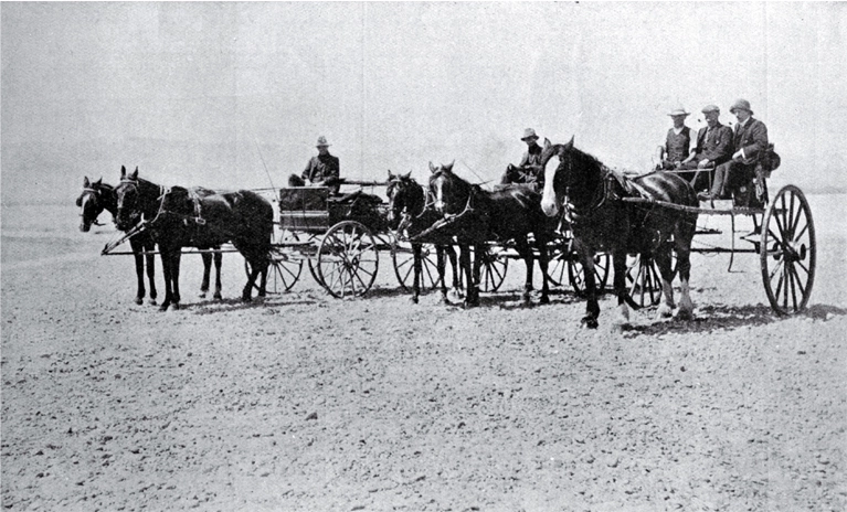 Horses and carriage at the Waiau River Bed, after crossing the stream from Cheviot, North Canterbury