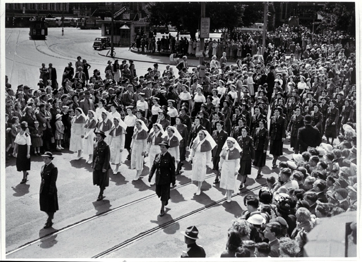 Representatives of the women's services march in the One Hundred Years of Progress parade