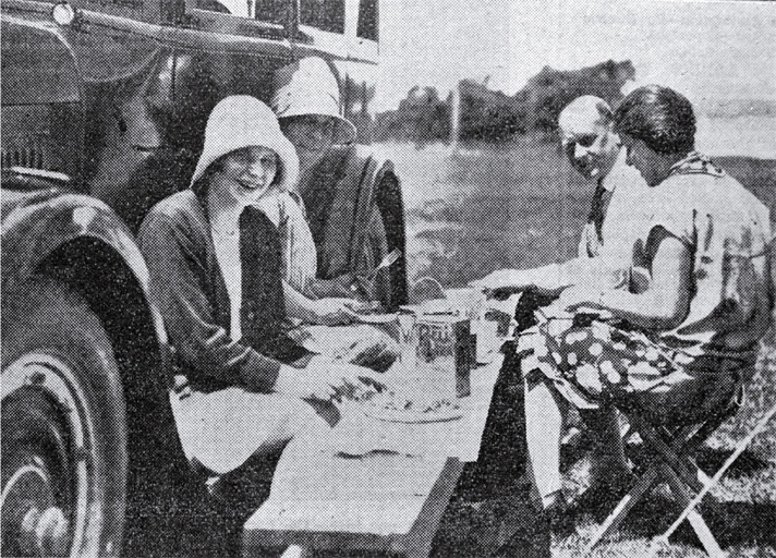 A family picnic on a summer's day at Addington Show Grounds' motorist's camping ground, Christchurch