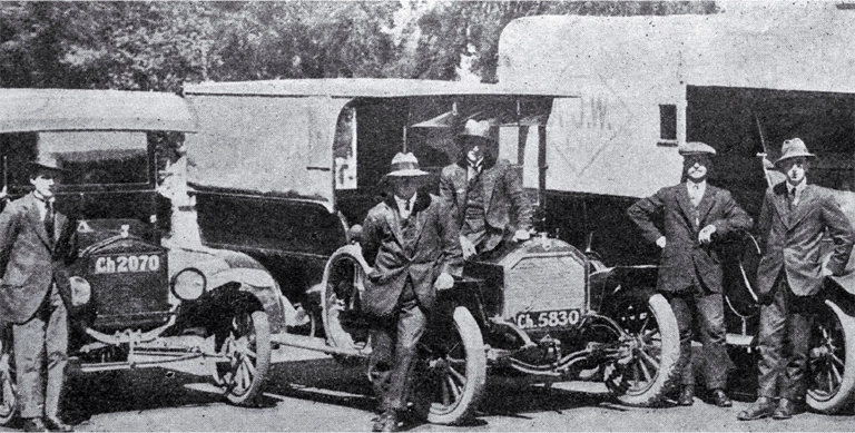 A section of a long photograph of vehicles used by the St John Ambulance Brigade as ambulances during the 1918 influenza epidemic