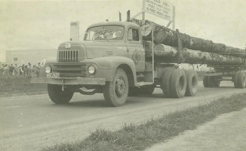 Egmont Box Company, Limited. A New Zealand Forest Products truck in Tokoroa procession, 1950s to 1960s