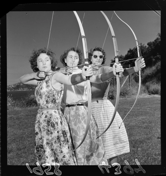 Three unidentified women archers