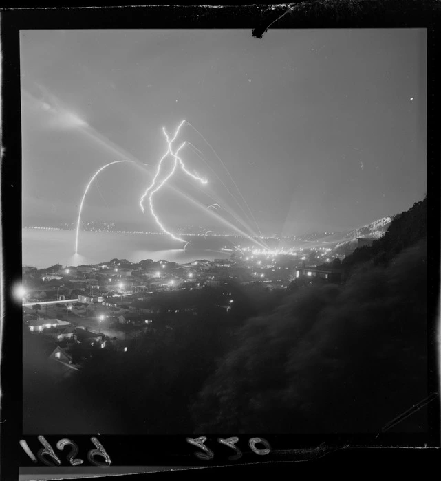 The night sky lit up by fireworks over Eastbourne, Lower Hutt