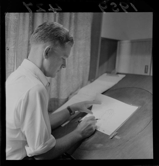 Unidentified man at the drawing board for a cartoon film being produced in Levin