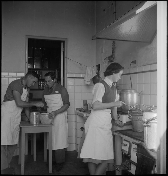 At work in the Tuis' kitchenette at the NZ Forces Club in Bari, Italy, World War II - Photograph taken by M D Elias