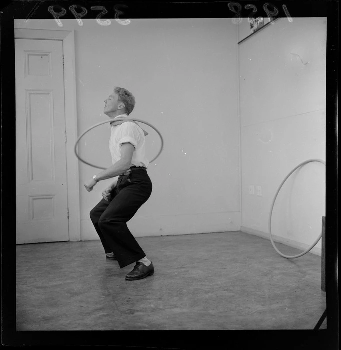 Mr C Matthews, demonstrating a Hula hoop, unknown location