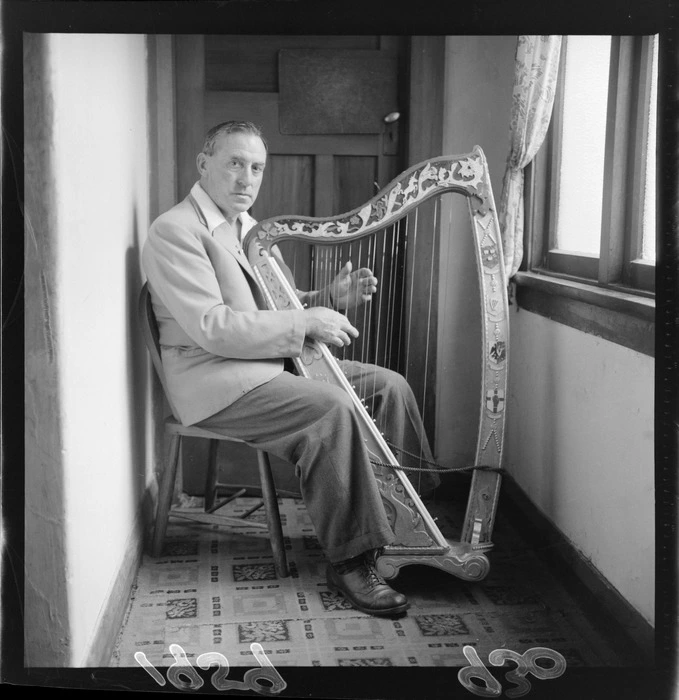 Mr Rupert George with his home-made Irish harp