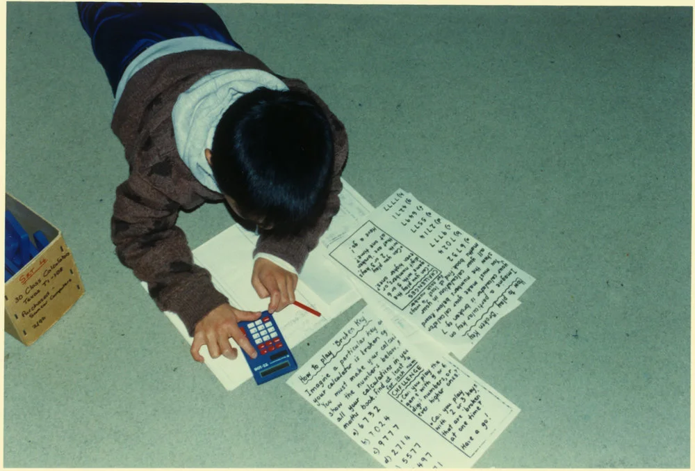 Child with calculator