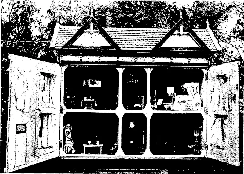 VIEW OF INTERIOR OF MINIATURE FOUR-ROOMED HOUSE, SHOWING FURNISHINGS.  This miniature four-rcomed cottage with bathroom, furnished complete, was mrde by Mr  Austin Cook. Roslyn, Dunedin. The rooms are 15in. by 15in., and 12in. high. It may be  mentioned that the furnishings are Mr Cook's wo~k a<? well as the buPchng ztself. (Otago Witness, 17 May 1905)
