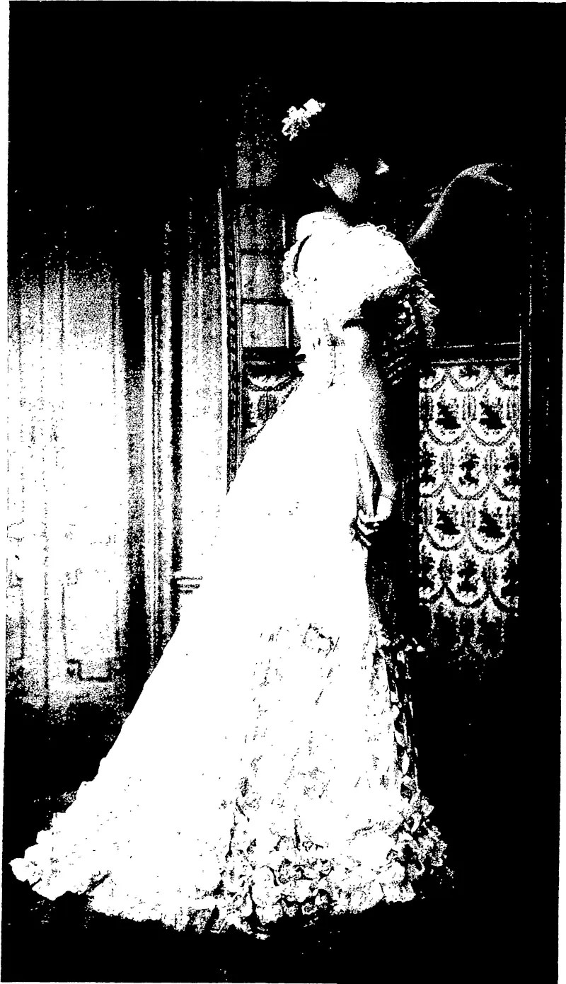 Felix, photo, Paris. BALL DRESS FOR A DEBUTANTE.  Ball dress of fancy tvTle, azure, trimmed wi*h narrow ribbon lattice work in same shade  (Zanmermann). (Otago Witness, 22 May 1907)