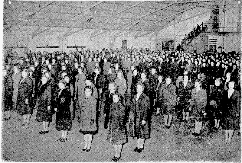 Evening Post"- Pnoto. A view of the parade of women and girls who have registered with the Women's War Service Auxiliary, held last evening at the Buckle Street Drill Hall. (Evening Post, 25 September 1940)