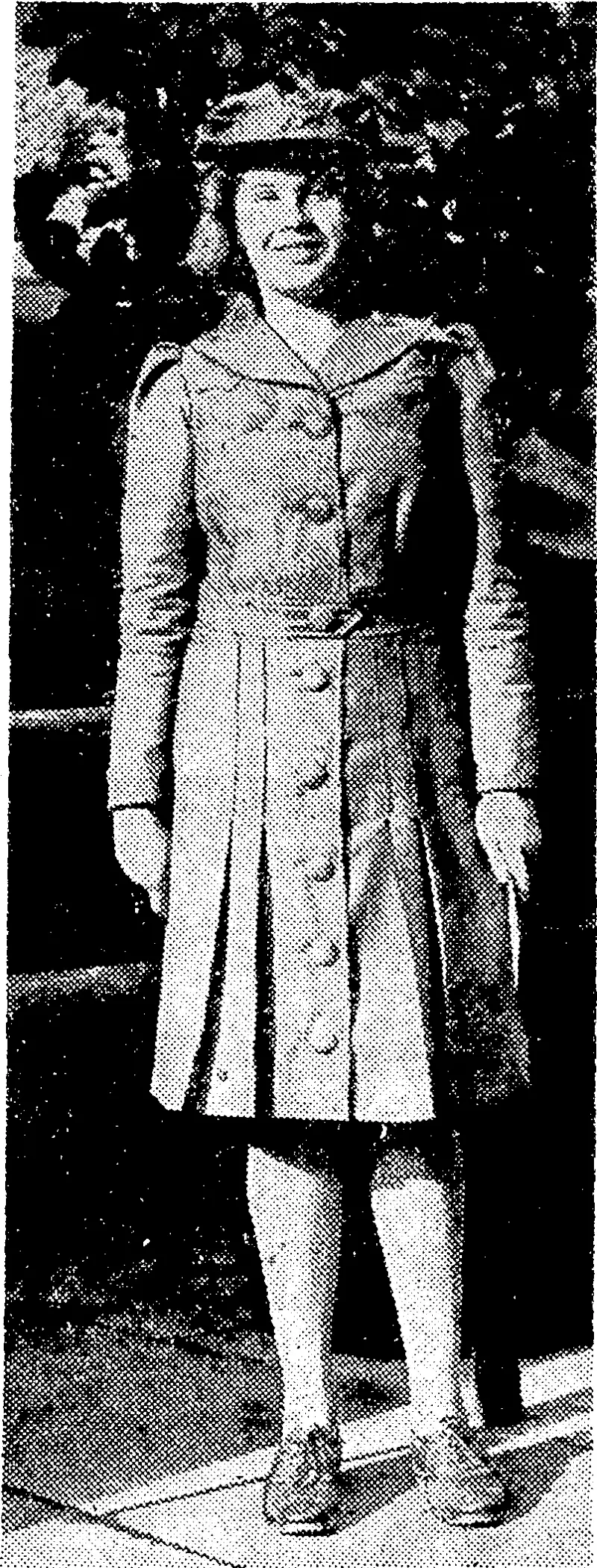 The first telegraph message girl to be employed by the Post Office in the present war appears in an attractive uniform supplied by the Department. (Evening Post, 25 June 1941)