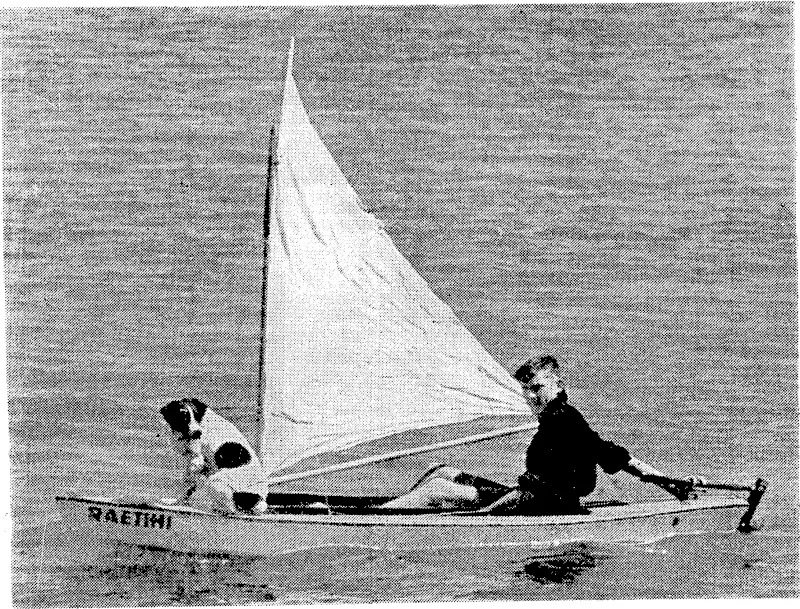 Evening Post" Photo. A canoe and its crew in Evans Bay on Saturday afternoon. The dog was quite unconcerned and .m-terested in his surroundings. (Evening Post, 06 January 1941)