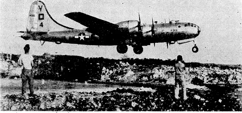 Lifting its heavy load of bombs at the end of the runway on Saipan, this United States Super-Fortress heads for Tokio in the early dawn. (Evening Post, 10 January 1945)