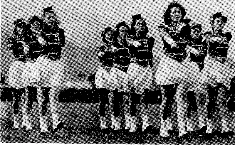 The "Minster" team, winners of the Hutt Valley Inter-house Girls' Association's marching championship, held at the Petone Recreation Ground on Saturday afternoon. They won both the marching and the march past events. The day was very tvindy, and the girls found difficulty in keeping their hats on. (Evening Post, 26 March 1945)