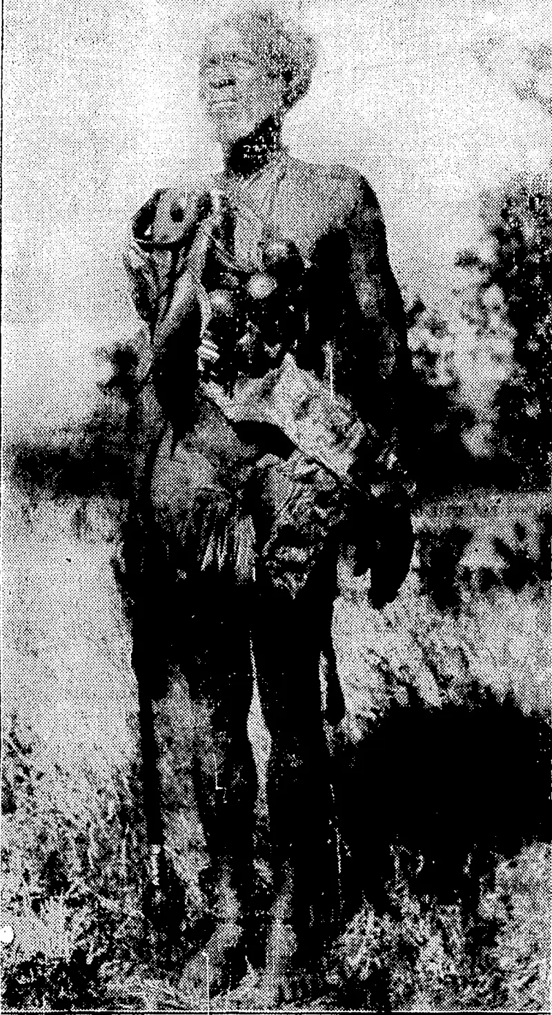 A Zulu witch doctor, all coitipleta with medicine chest and float-horn bottles, as he appeared at a welcome to the All Blacks during the present tour of South Africa. (Evening Post, 04 August 1928)