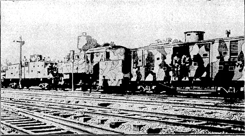 Sport ana Genera)" Photo. WAR CLOUDS IN MANCHURIA.—A camouflaged armoured train used in' Southern Manchuria during the hostilities between China and Japan. In times of peace the Japanese use these trains to outwit'the • bandits. ■ (Evening Post, 25 November 1931)