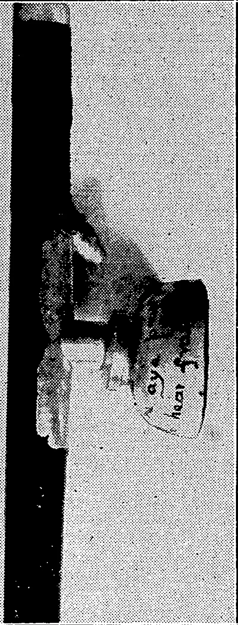 Evening I'ost" Photo.. OPIUM PIPE, captured during Saturday night's raid in ■ Haining street. (Evening Post, 22 February 1932)
