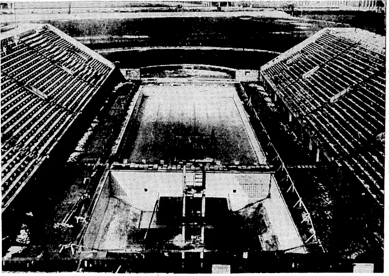 Sport and General" Photo. PREPARING FOR THE OLYMPIC GAMES.—A view of the,swimming and 'diving pools which are being built in, a portion ?/-the-Reich Spprts>Field,qtßjzTU^^ (Evening Post, 08 April 1936)