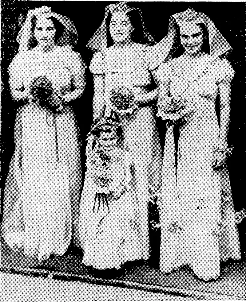 v "Sport and General" Photo. The bridesmaids at the marriage of the Chilean tennis player Senorita Anita Lizana, who was married to Mt. Ronald Ellis at the Brompton Oratory, London, on July 14. Miss Peggy Scriveh, herself a wellknown tennis player, is in the centre, and the others are Miss Sophie Abed (left) and Miss Joan Physick. Norma Ellis is the flower girl. (Evening Post, 05 August 1938)