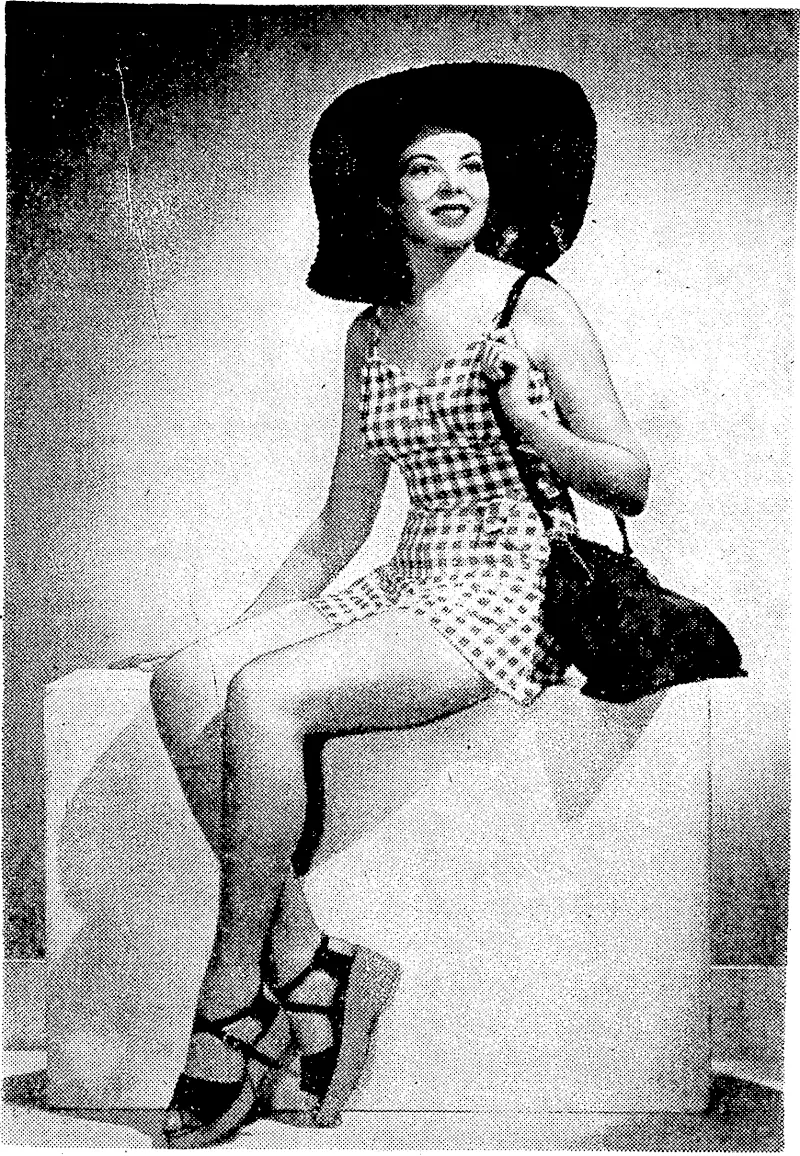 Tablecloth check in royal blue and white rayon mixture fabric is used for this smart bathing suit. The crownless hat of rough straw, the rubber-lined beach bag, and the cork-soled clogs are all in deep blue colour. (Evening Post, 26 November 1938)