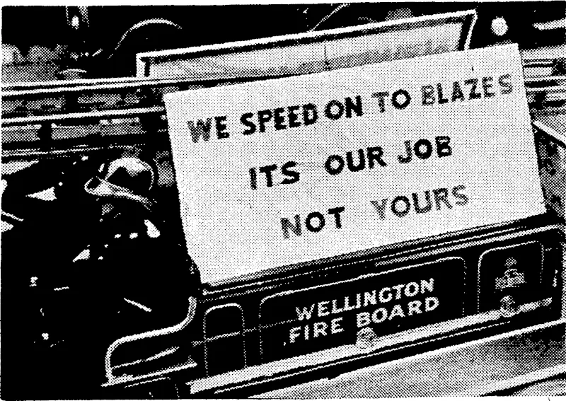 Evening Post" Photo. Pertinent advice to motorists was a feature of yesterday's "Road Safety Week" procession through the city. The above sign was carried on one of'the fire engines. (Evening Post, 06 December 1938)