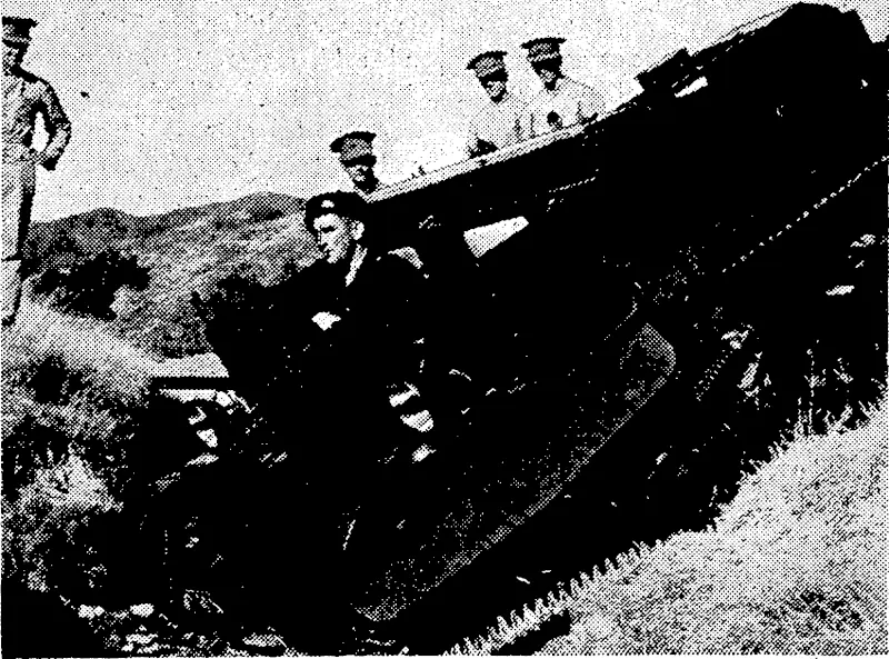 Sergt.-Major W. H. Bromley crossing a ditch approximately^ 6ft wide and 6ft deep with a Bren armoured carrier. A demonstration of the . new machines is to tflke place at Trenthdm on April, 15. (Evening Post, 27 March 1939)