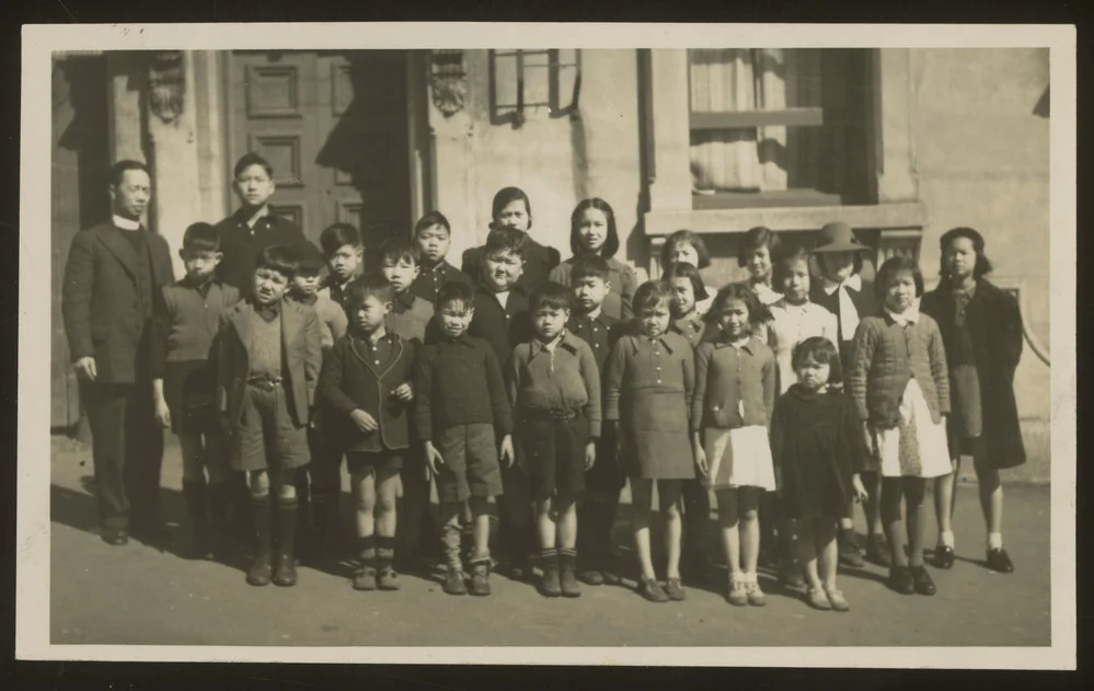 Group portrait of Chinese minister and children