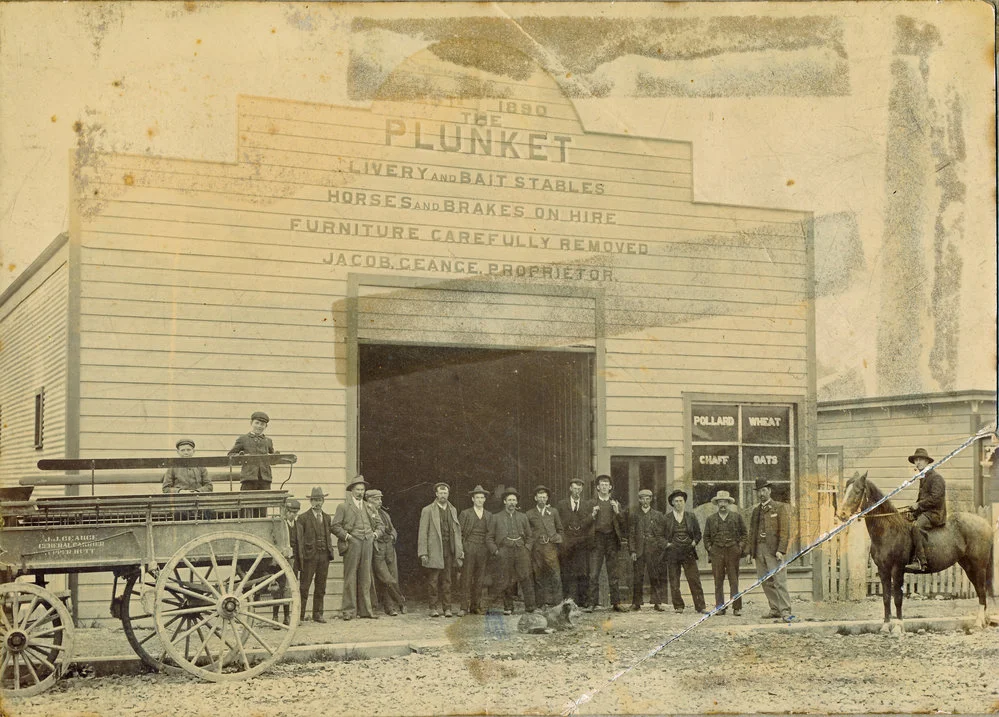 Plunket Bait and Livery Stables, Main Street; ca 1900