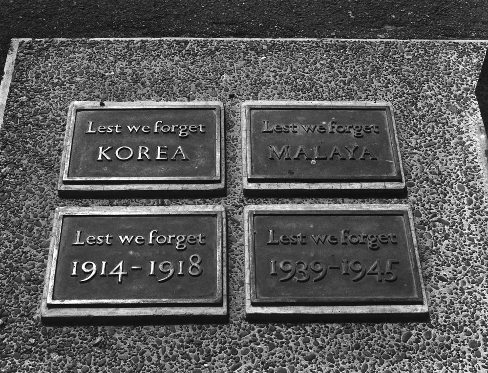 War memorial plaques, on pavement outside City Council offices.