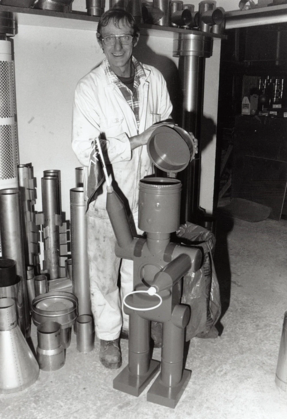 The Flue Shop, 63 Montgomery Crescent; Roy Tomlinson and ornamental robot.