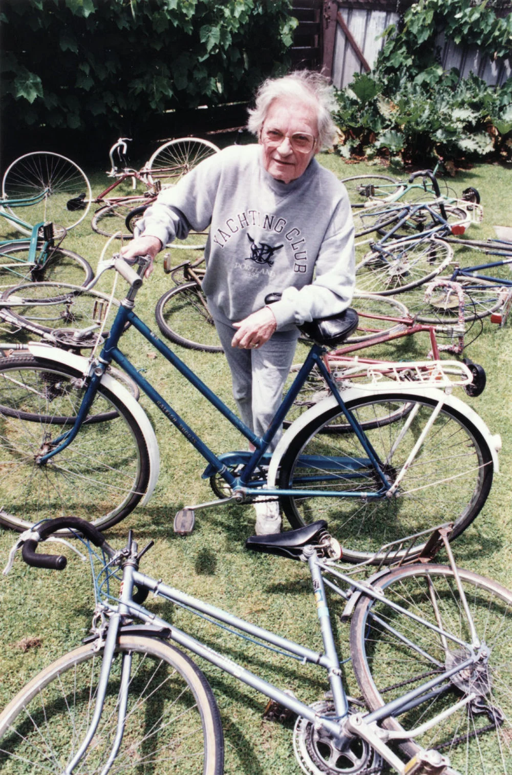 English Learning and Social Group; Maureen Wilson with second-hand bikes for migrant families.