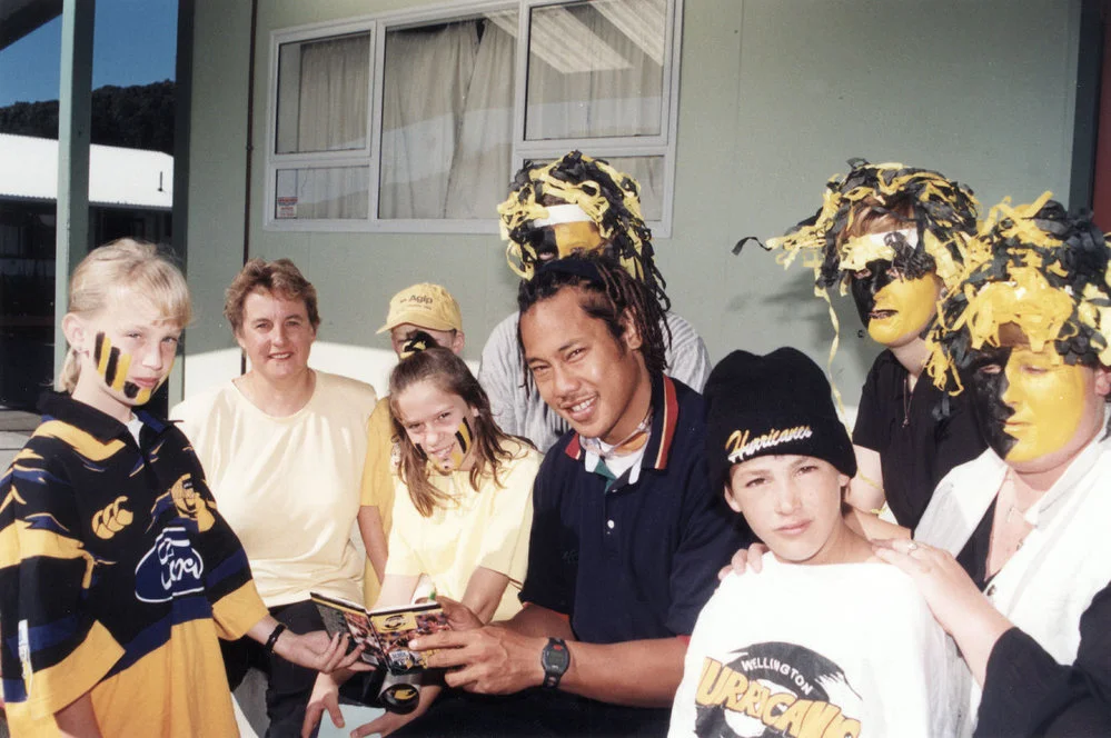 Birchville School; Tana Umaga signs an autograph