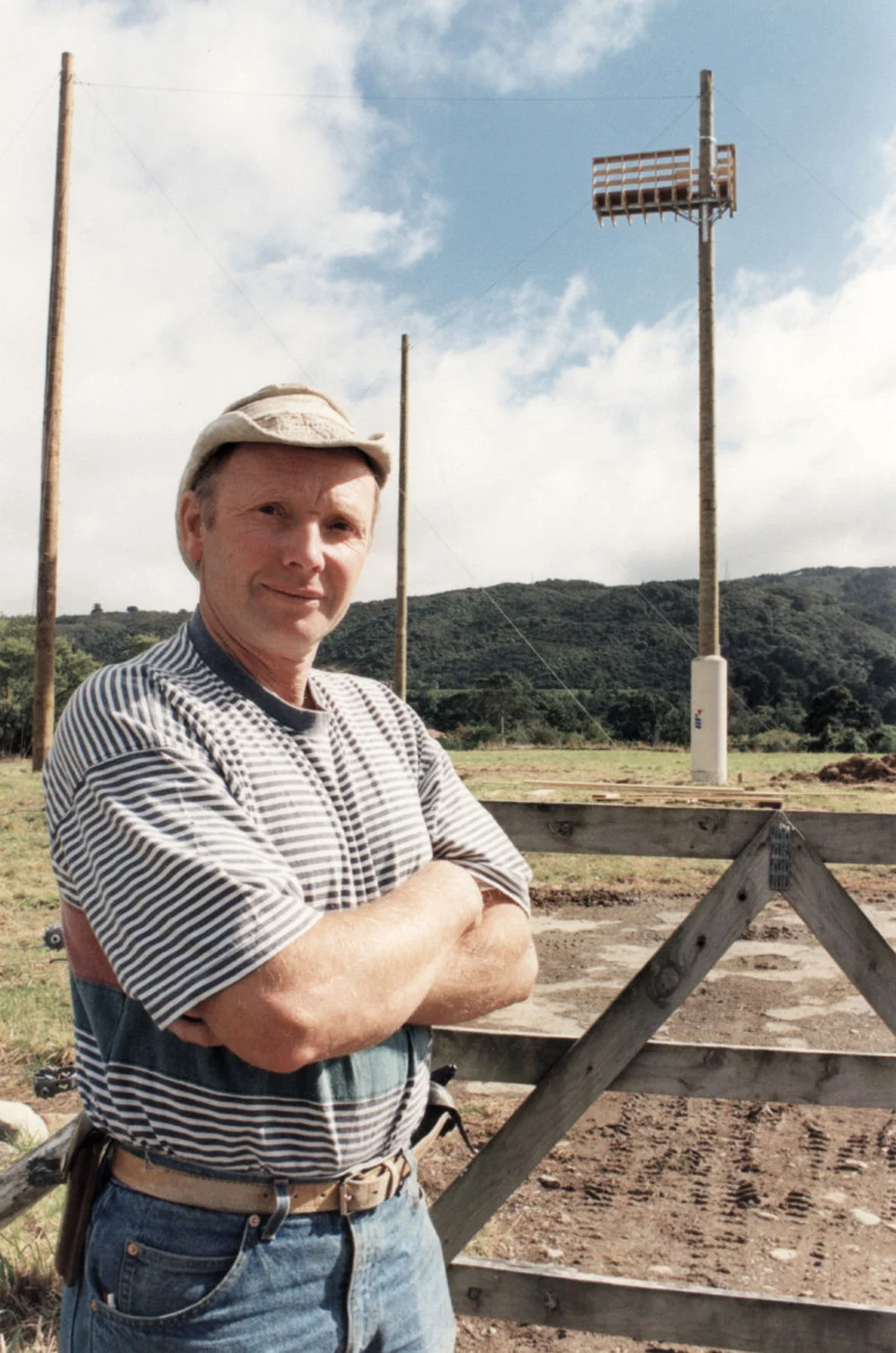 Te Marua; "Black stump giant pole swing" with its builder Ian Sherwin.