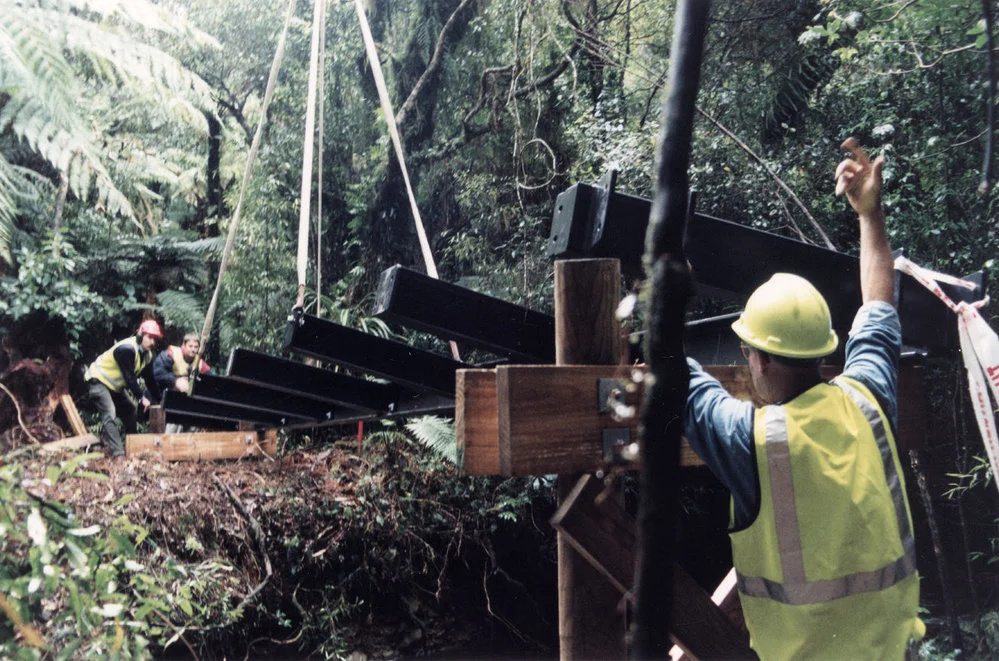 Tunnel Gully reserve footbridge being helicoptered into position.