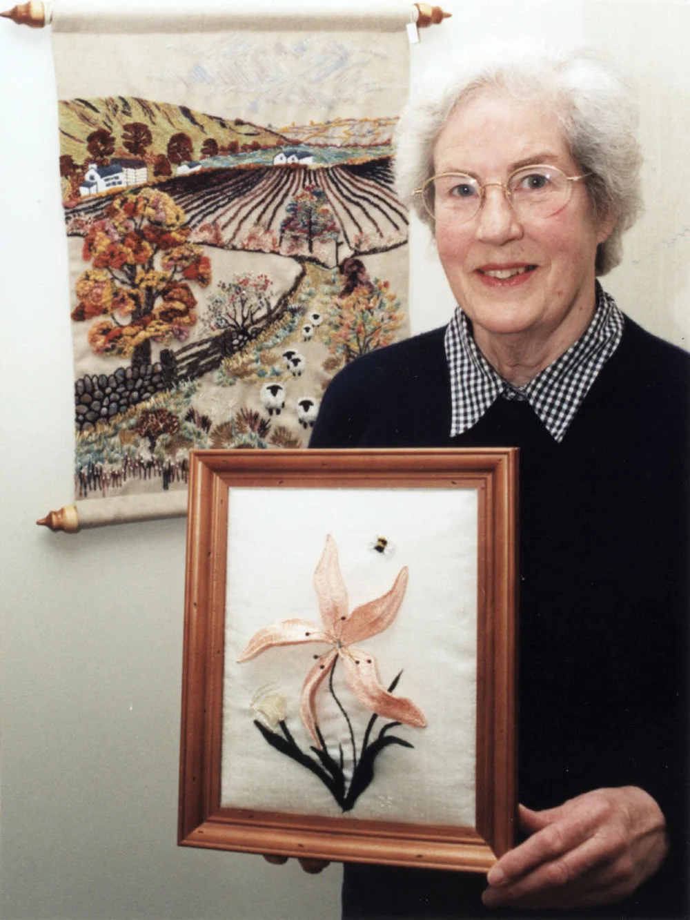 Embroiderers' Guild; Dorothy Bayley with works for Community Gallery exhibition.