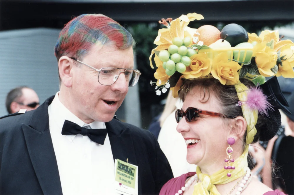 Trentham racecourse; Wellington Cup day fashion; city promotion manager Paul Lambert, and Ngaire Mann with $8 hat.