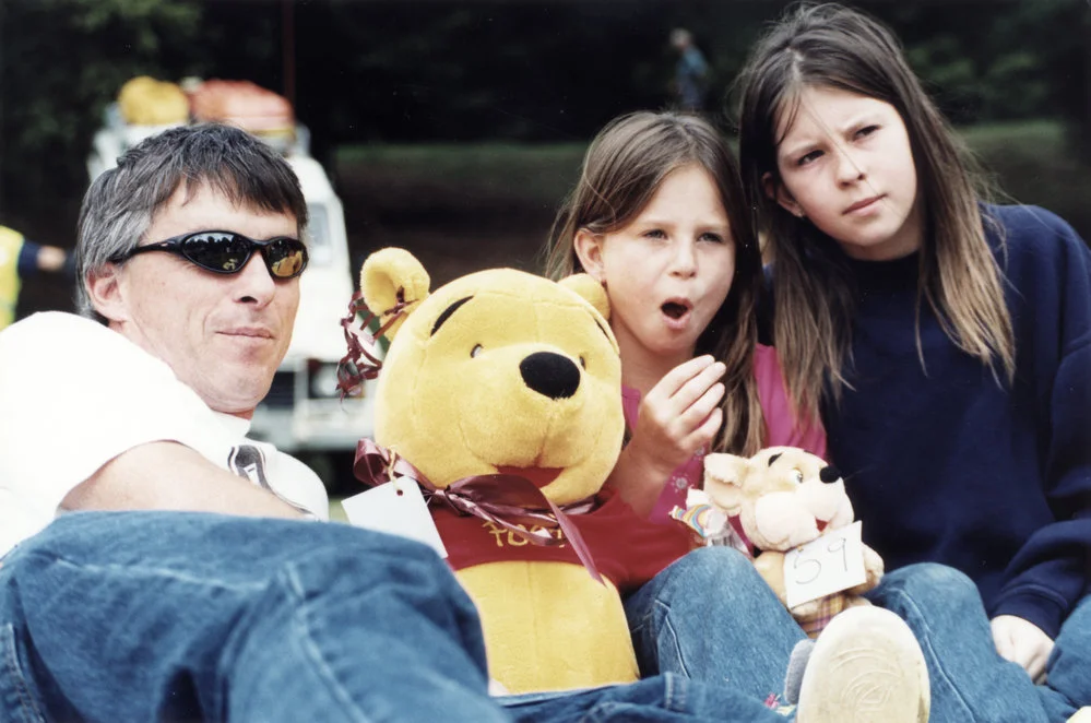 Teddy bears’ picnic, 2000; Brent Duffy with daughters Jessica and Sara.
