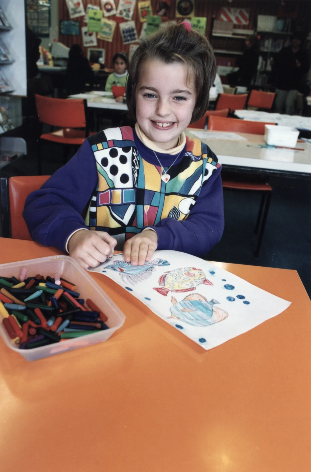 Library; children's holiday programme; Ellen Press, 9, at a drawing session.