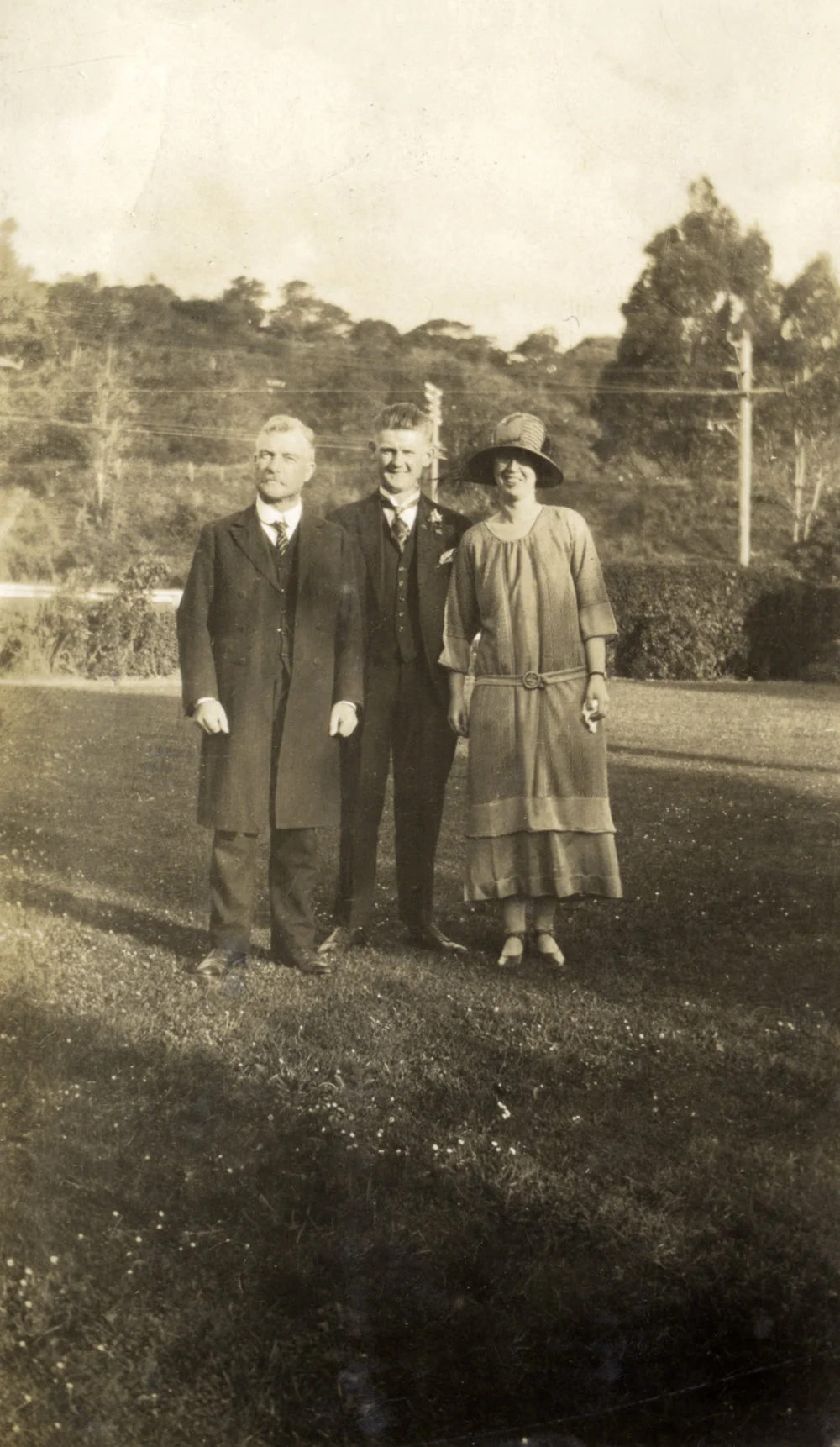 Hazelwood family; wedding 2; groom's father(?) with unidentified bride and groom, at J A Hazelwood's.