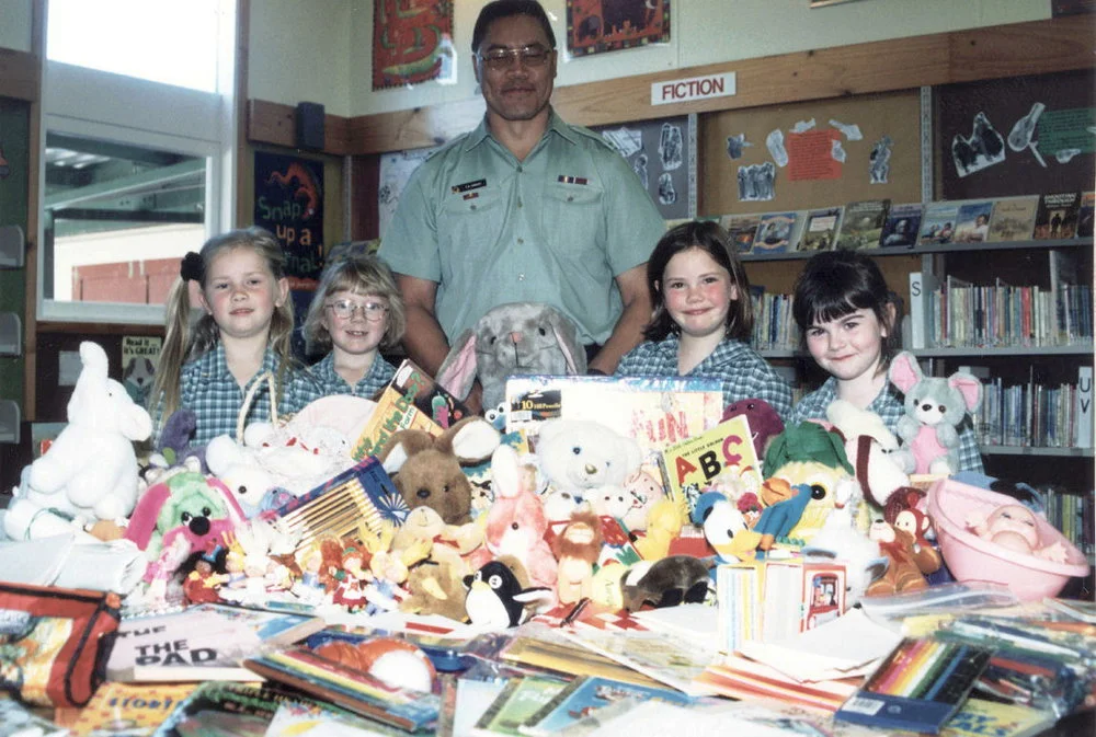 St Brendan's School; Sergeant Major Tama Hiroti and toys gathered for East Timor children.